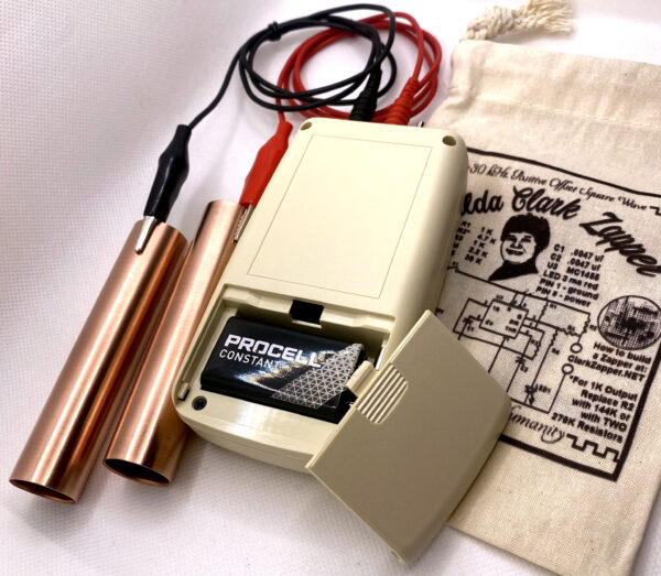 Hulda Clark Zapper with red/black leads, copper pipes, 9 volt battery, and canvas carry-all bag.