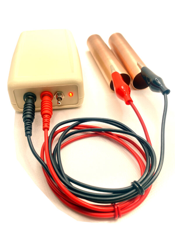 Hulda Clark Zapper with red/black leads, copper pipes, 9 volt battery, and canvas carry-all bag.